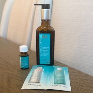Moroccan oil treatment serum 3.4oz bottle w pump and extras-used 1-2 times only